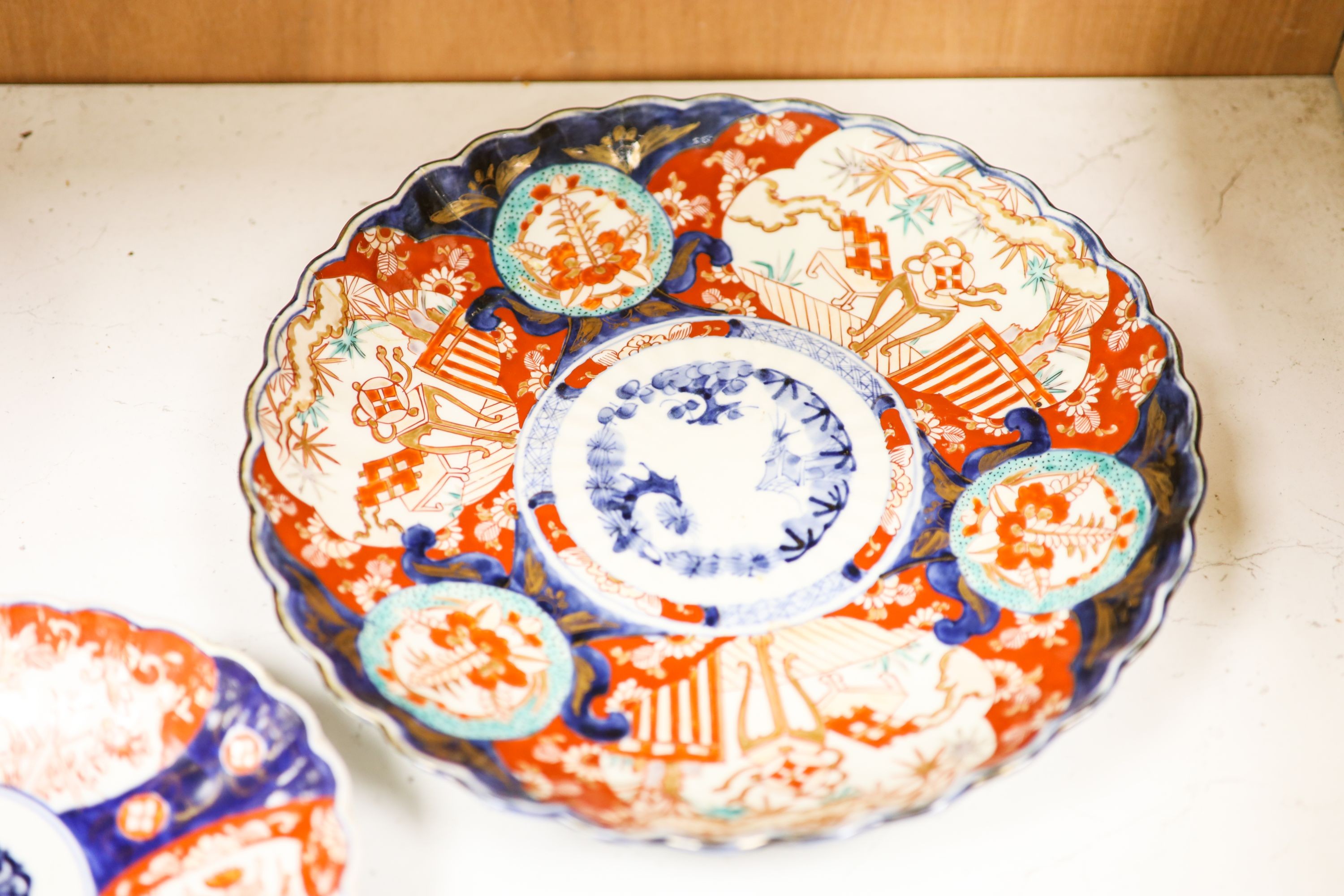 Five Japanese Imari dishes, largest 30.5 cm